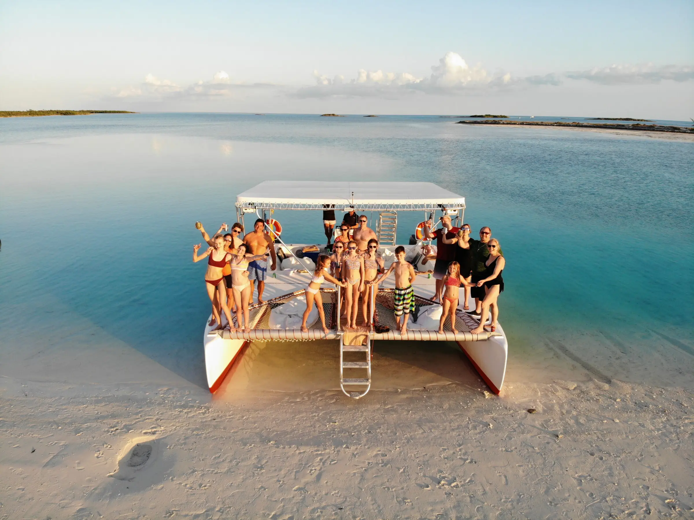 Guests on Slat Cat pulled up on a sandbar