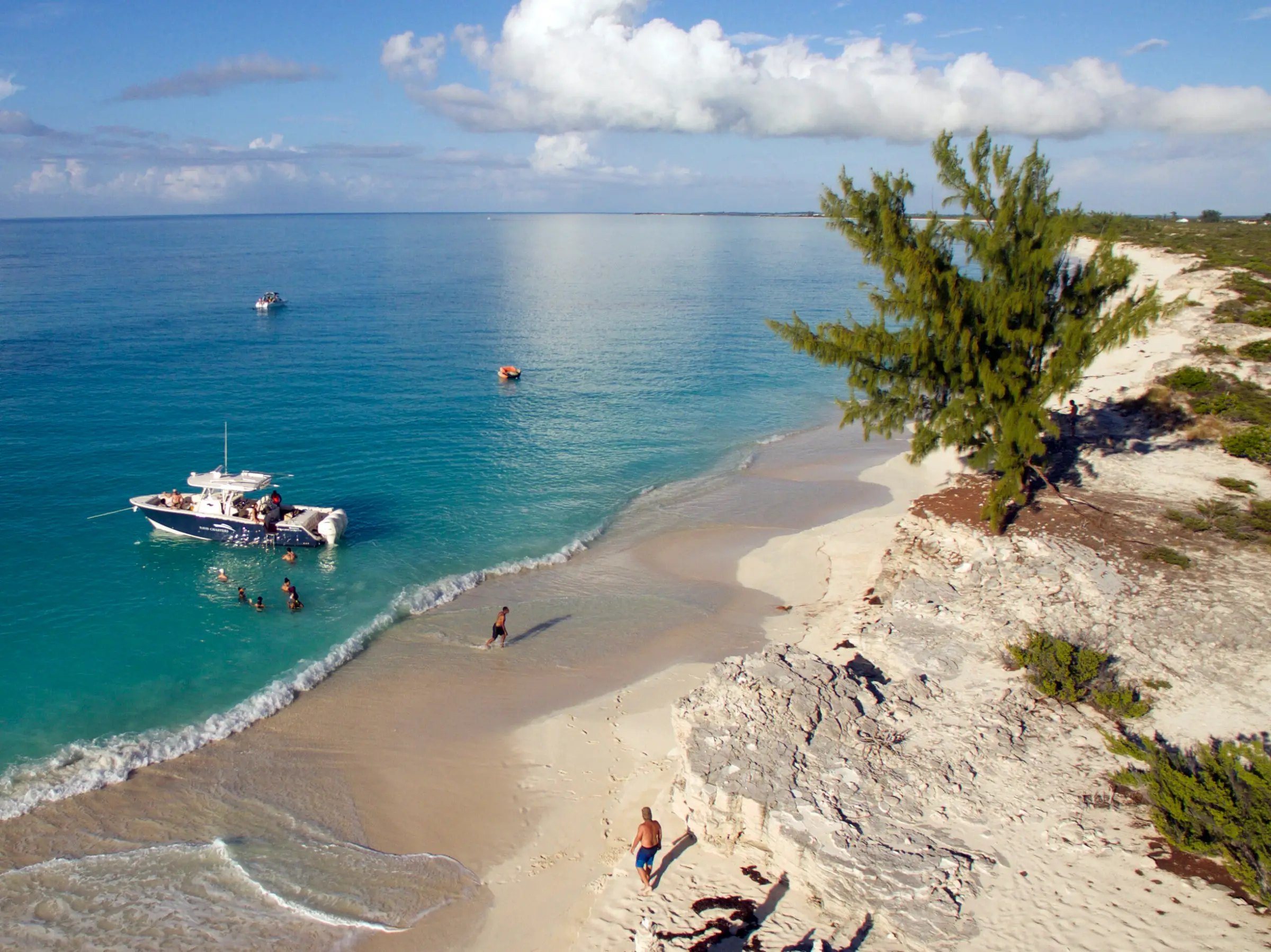 Sweet T anchored off a quiet beach